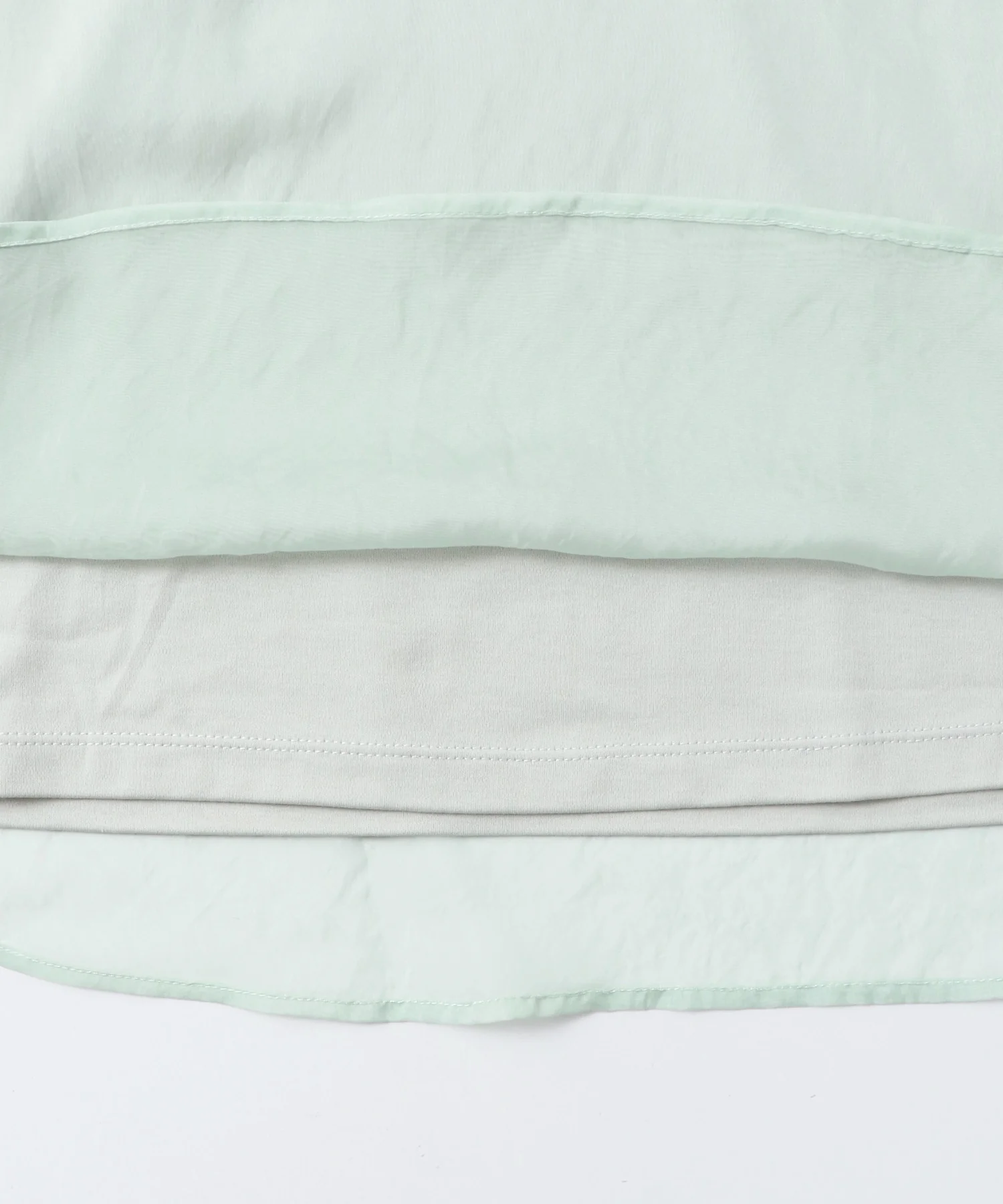 ニュアンス シアーレイヤードトップス